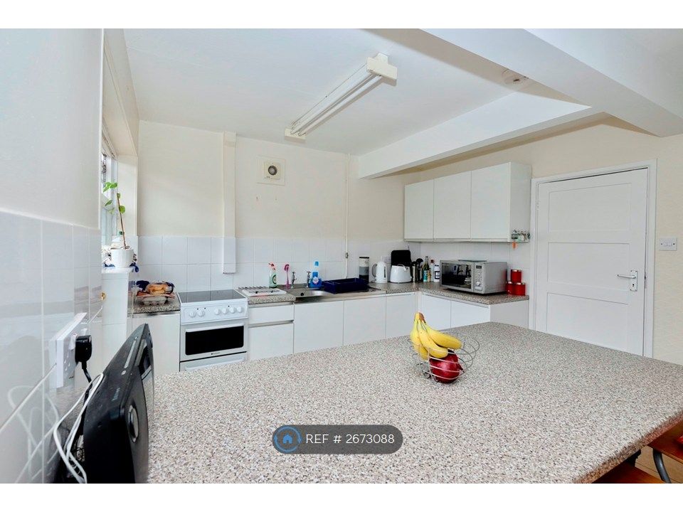 Property photo 2 of 7 Breakfast Bar/Kitchen