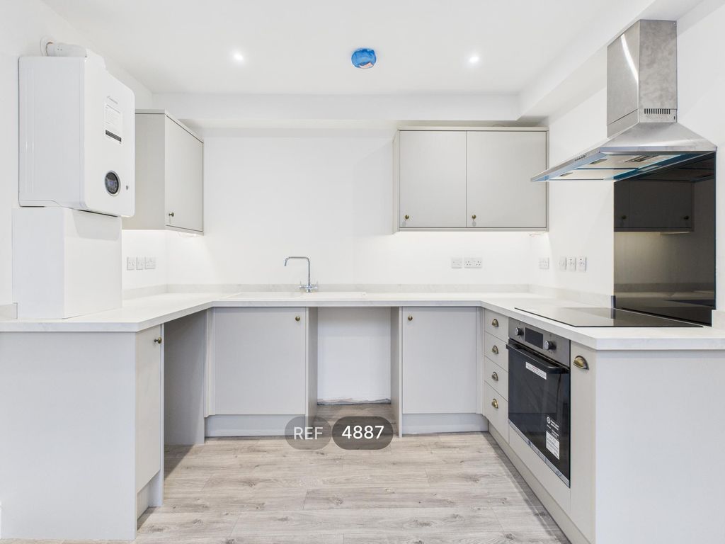 Property photo 2 of 12 Kitchen / Living Area