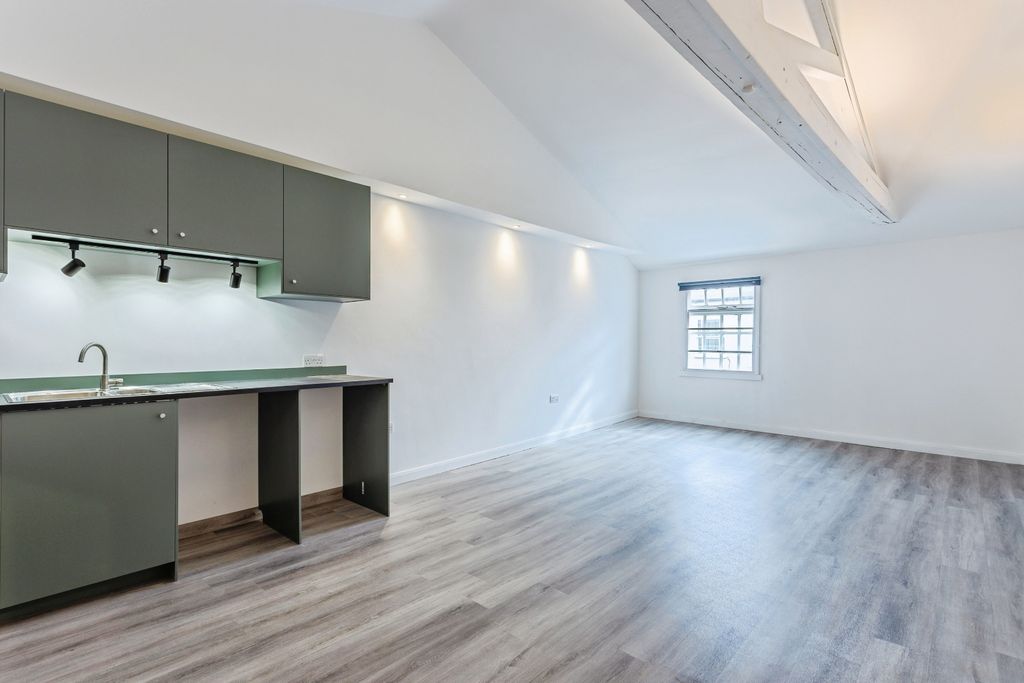 Property photo 1 of 6 Kitchen Living