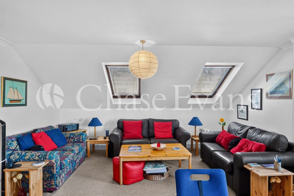 Property photo 1 of 12 Living Area