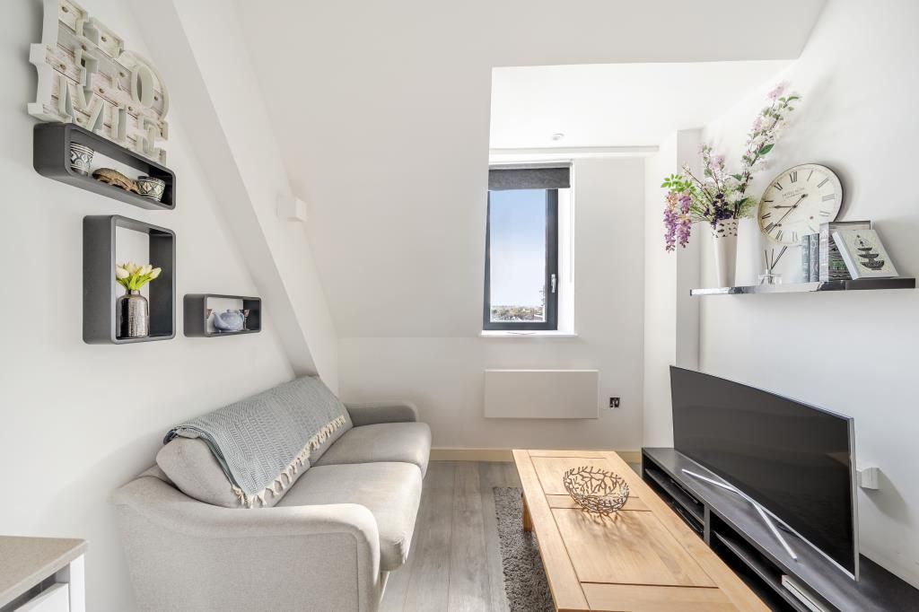 Property photo 3 of 17 Living Area