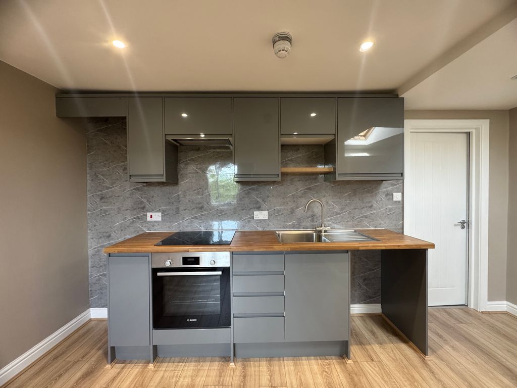 Property photo 1 of 8 Kitchen