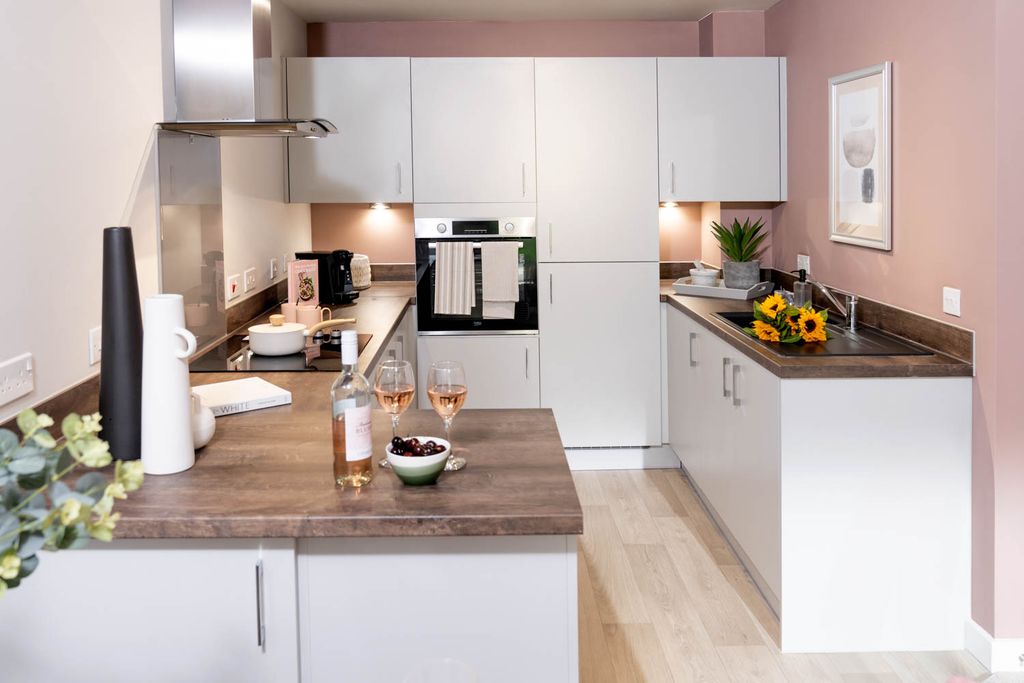 Property photo 1 of 11 Typical Kitchen