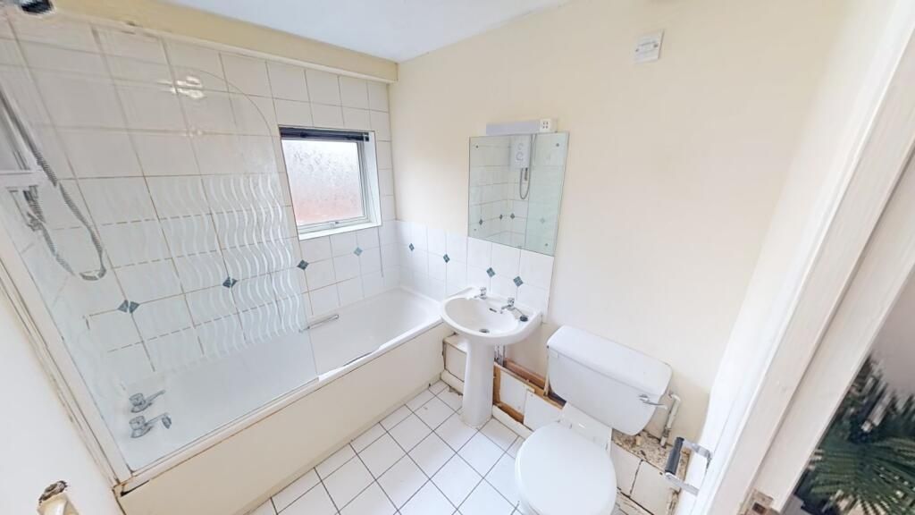 Property photo 3 of 6 A Bright, Clean Bathroom Suite Featuring A White B...