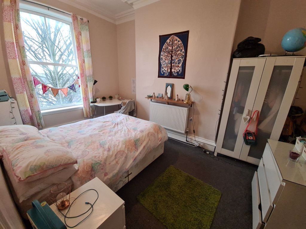 Property photo 1 of 10 A Cozy Double Bedroom Featuring A Large Window Wit...