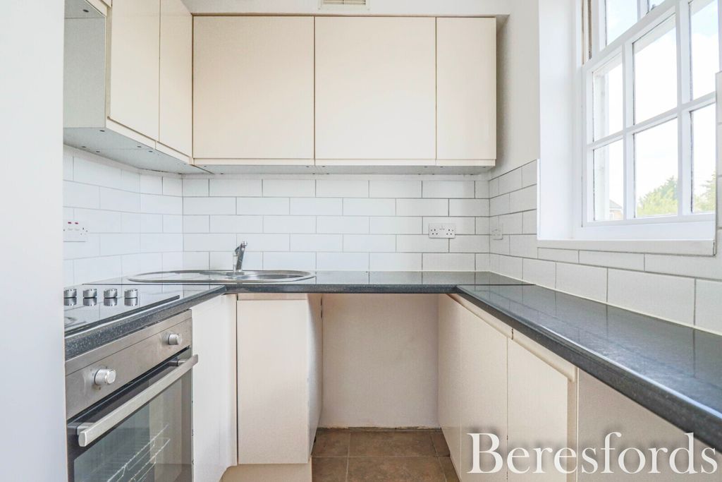 Property photo 3 of 7 Kitchen