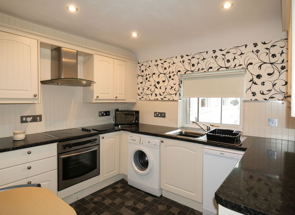 Property photo 2 of 12 Kitchen