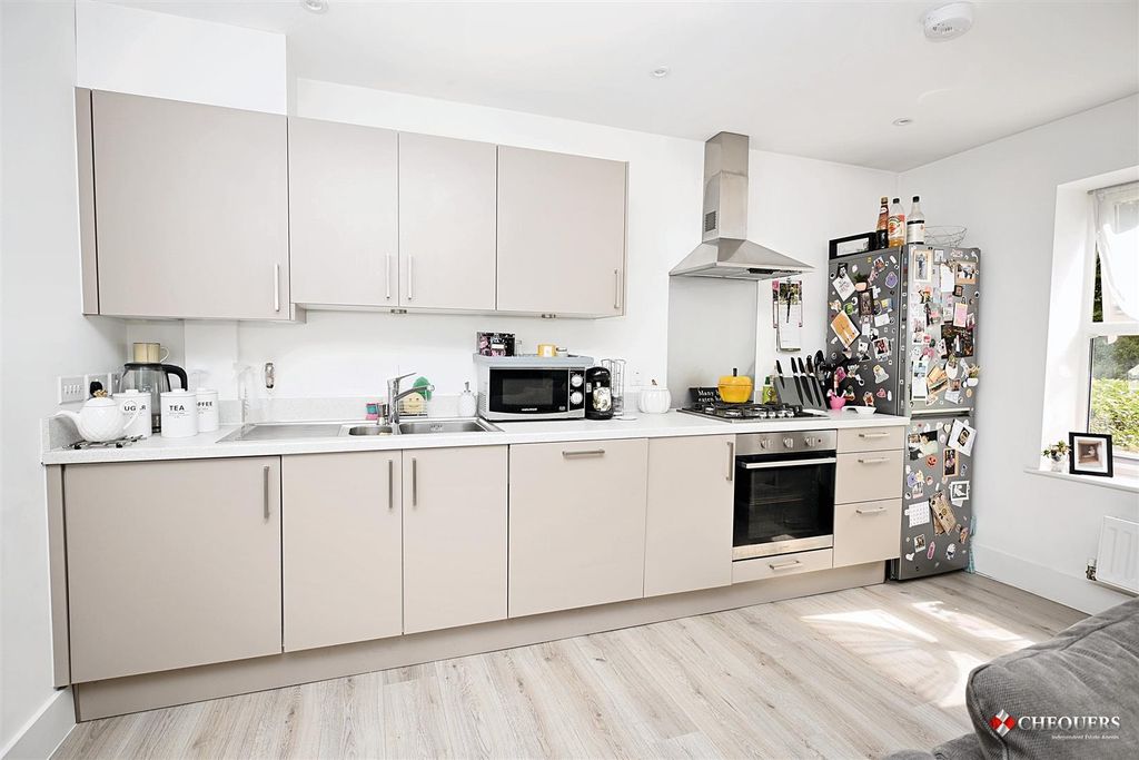 Property photo 3 of 11 Kitchen Area