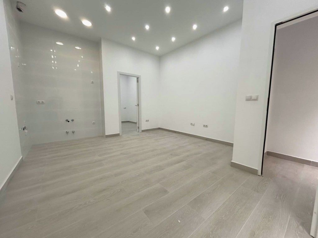 Property photo 3 of 7 Kitchen Area - Living Room (2)