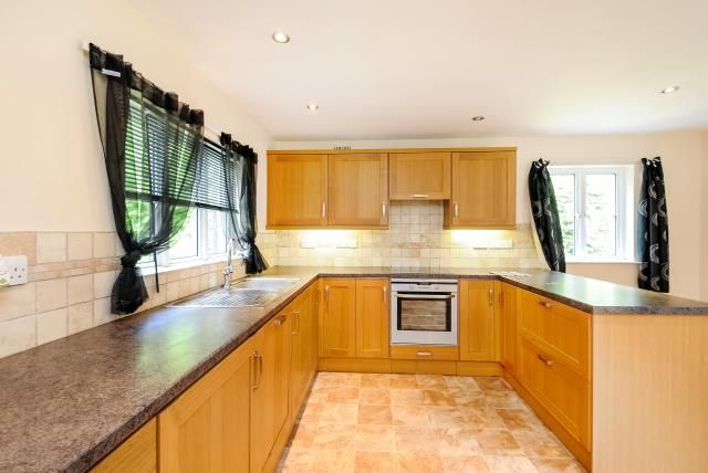 Property photo 2 of 8 Kitchen