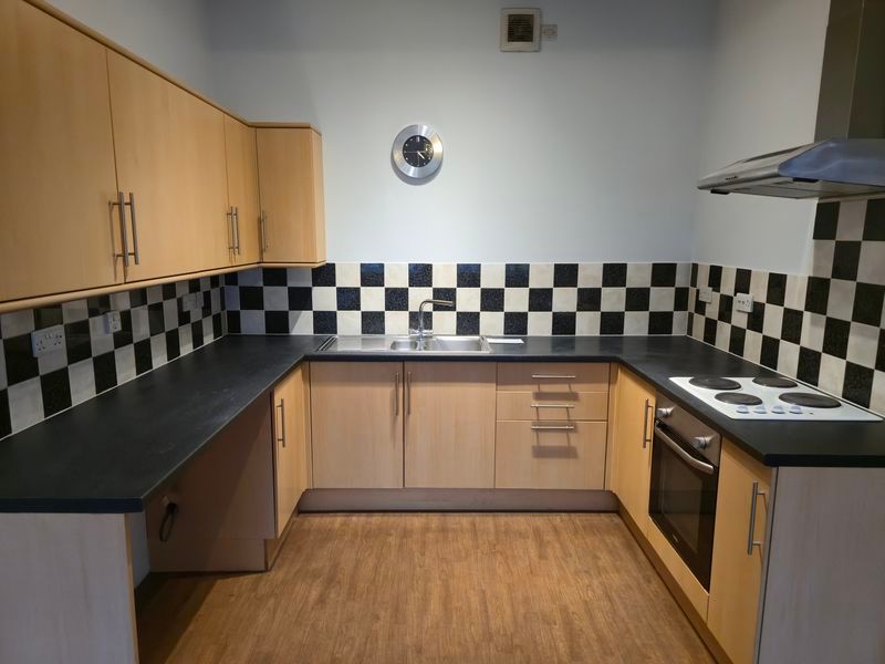 Property photo 3 of 7 Kitchen