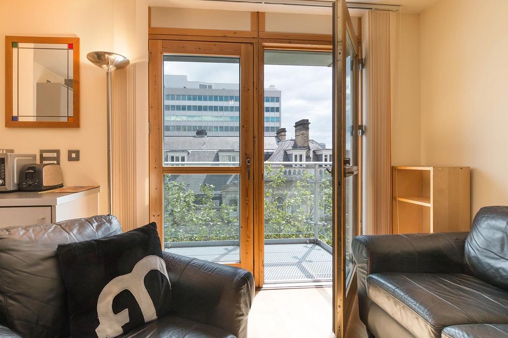 Property photo 2 of 11 Living Area