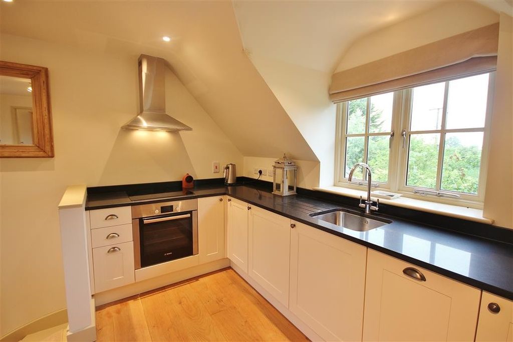 Property photo 3 of 7 Kitchen