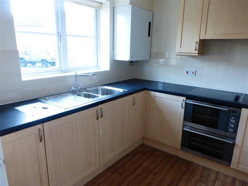 Property photo 3 of 8 Kitchen