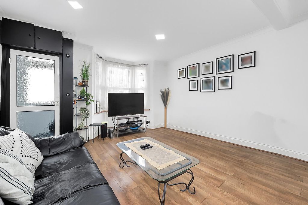 Property photo 2 of 17 Modern Living Room With Natural Light.Png