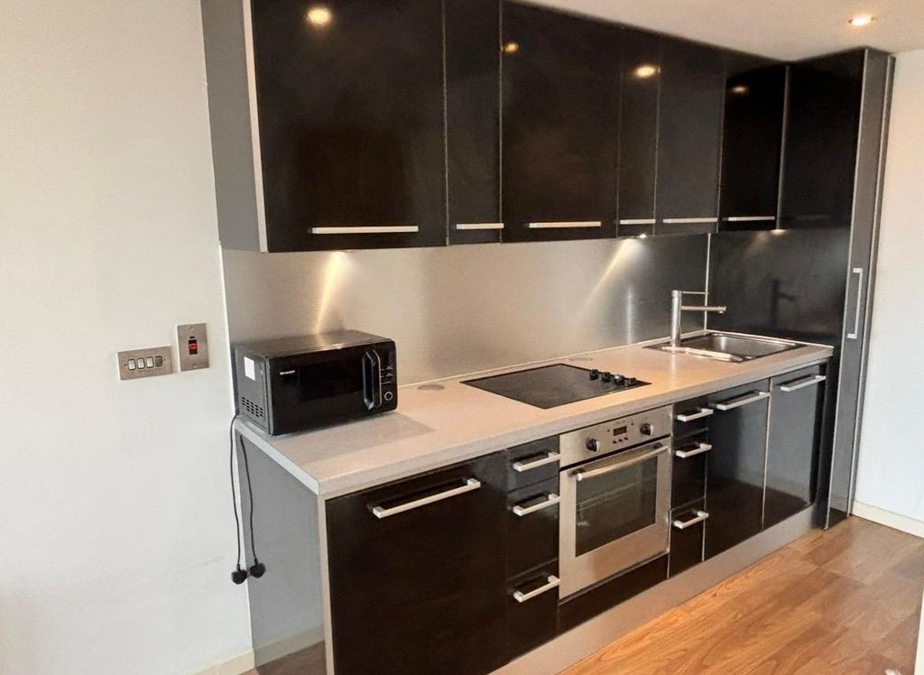 Property photo 2 of 9 Sleek Modern Kitchen With Integrated Appliances...