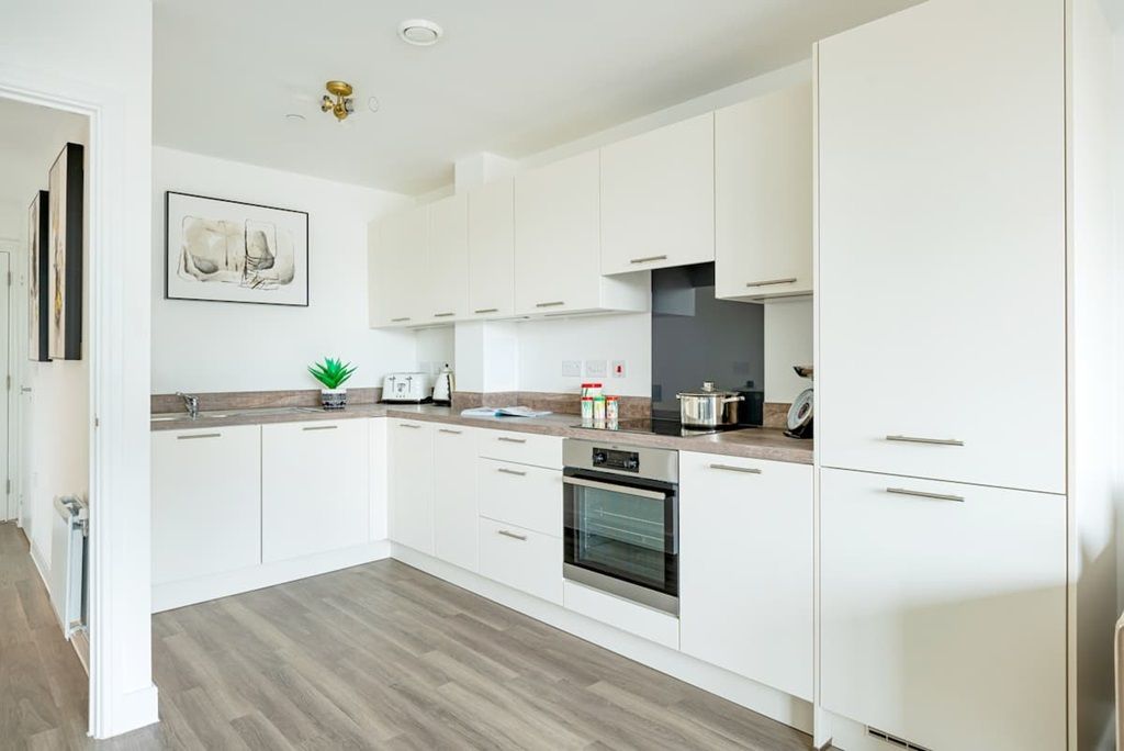 Property photo 2 of 13 Seamlessly Designed Kitchen