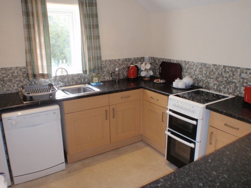 Property photo 3 of 7 Kitchen