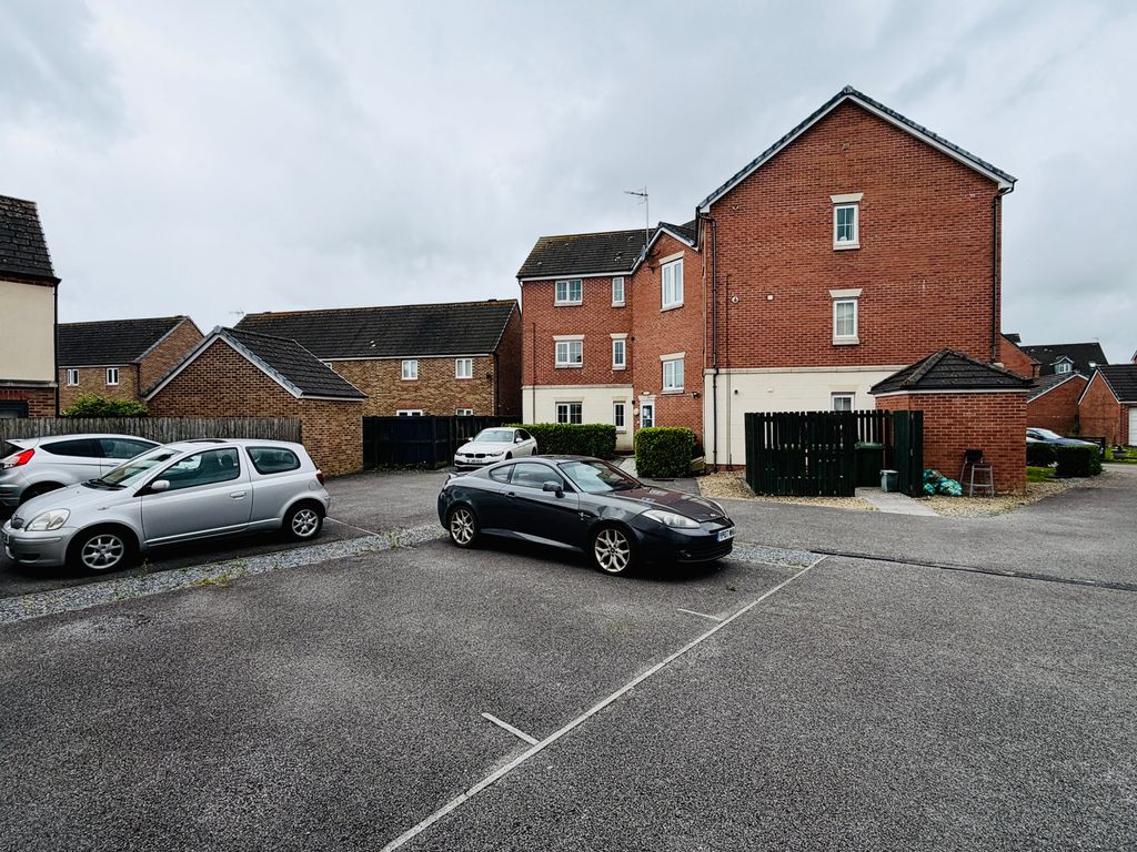 Property photo 2 of 12 Parking Area - Allocated Space With Dark Grey Car