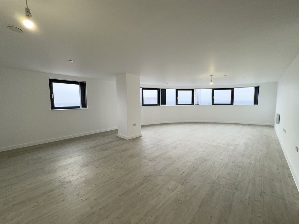 Property photo 1 of 11 Living Area