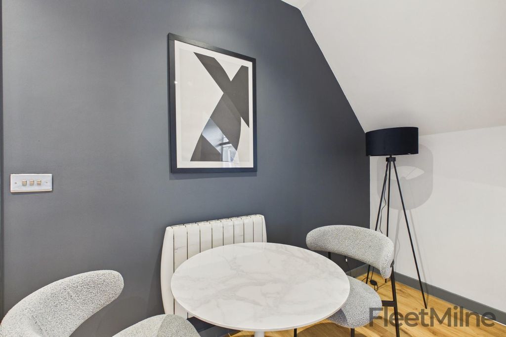 Property photo 3 of 8 Living/Dining Room