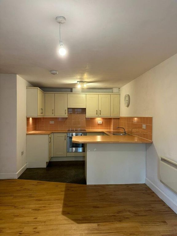 Property photo 3 of 8 Kitchen