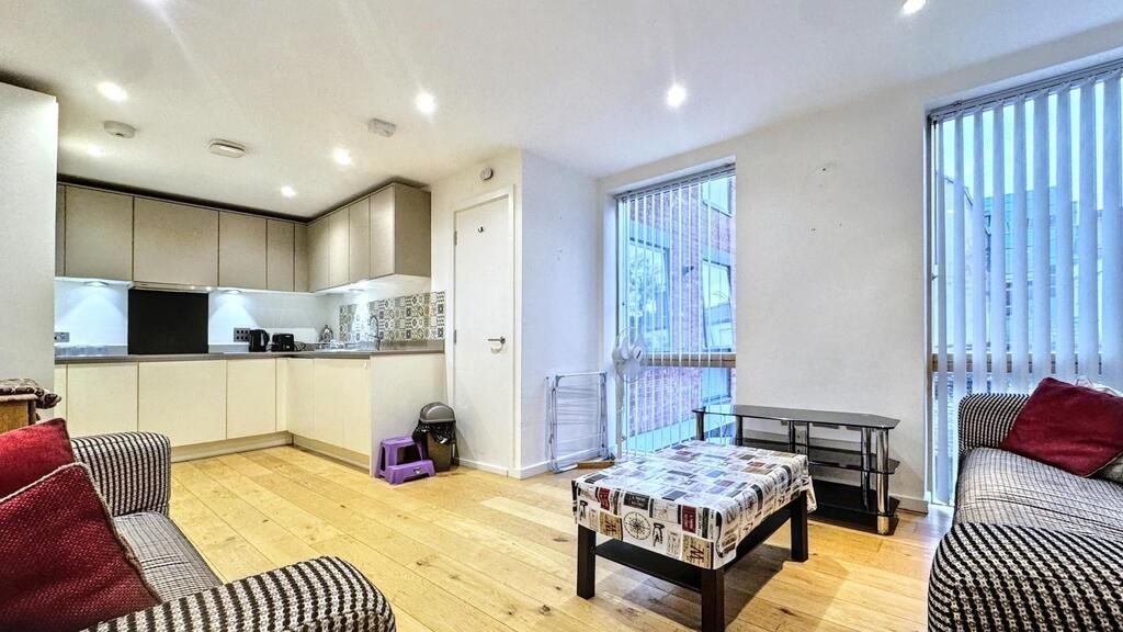 Property photo 1 of 10 Bright Open-Plan Living Area With A Modern Fitted ...