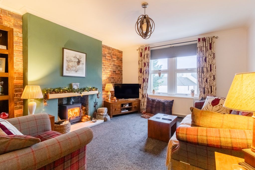 Property photo 2 of 16 Lounge With Stove