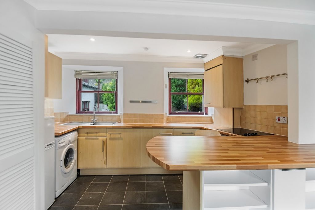 Property photo 3 of 9 Kitchen