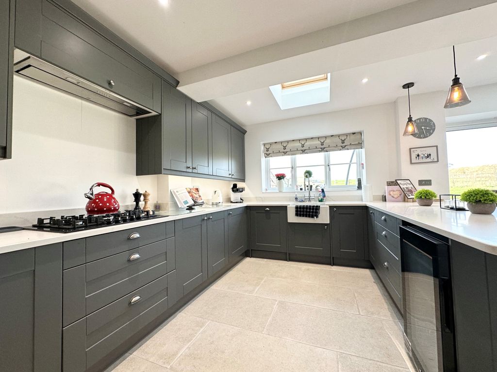 Property photo 3 of 24 Front