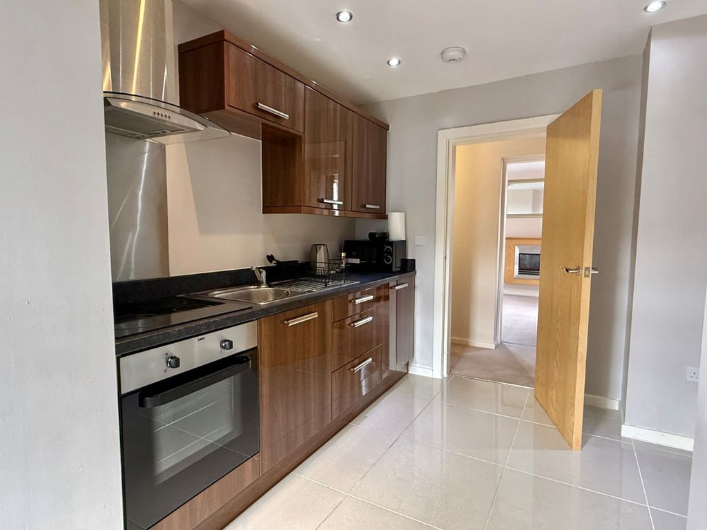 Property photo 3 of 12 Kitchen