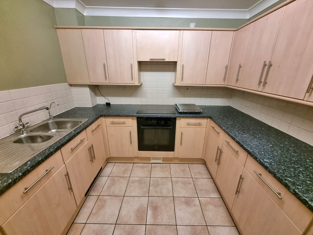 Property photo 2 of 8 Kitchen