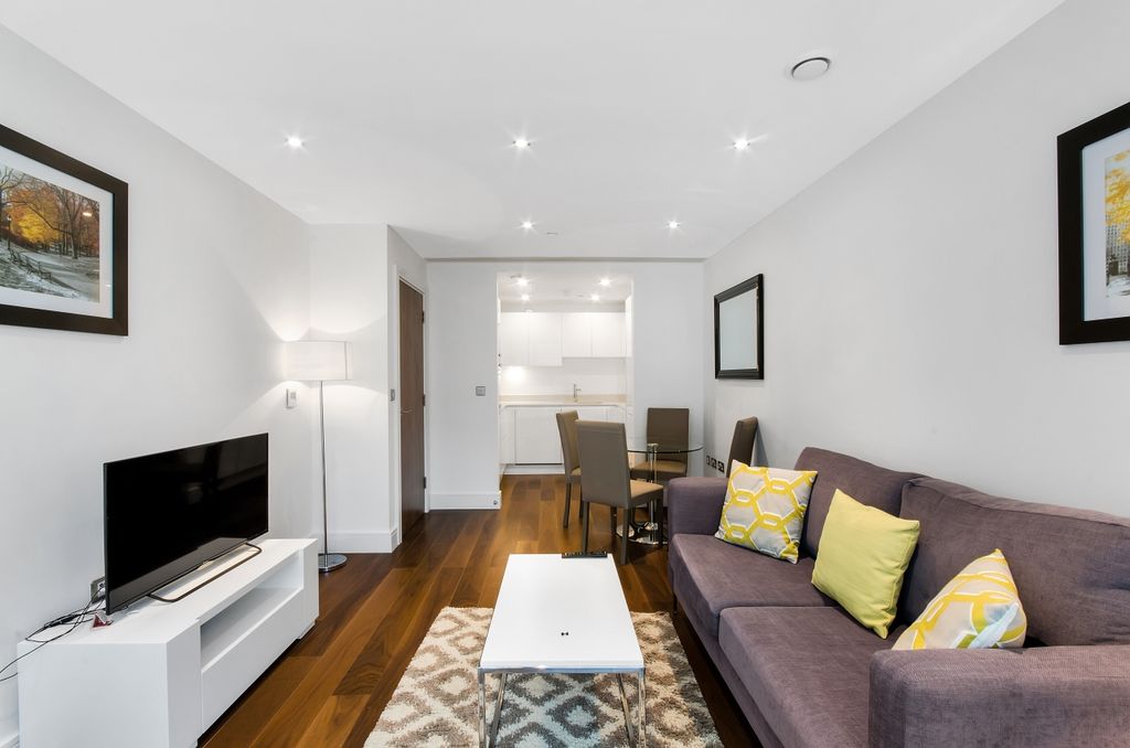 Property photo 3 of 8 Living Area