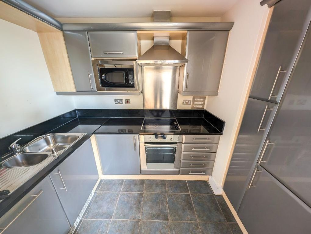Property photo 1 of 9 Kitchen