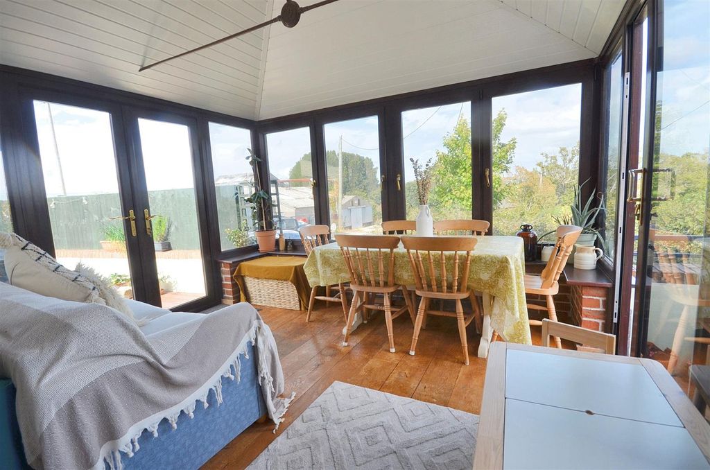 Property photo 3 of 11 Conservatory