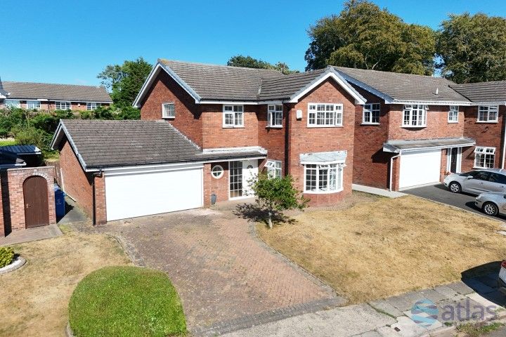 Property photo 1 of 33 Aerial Front Elevation & Driveway