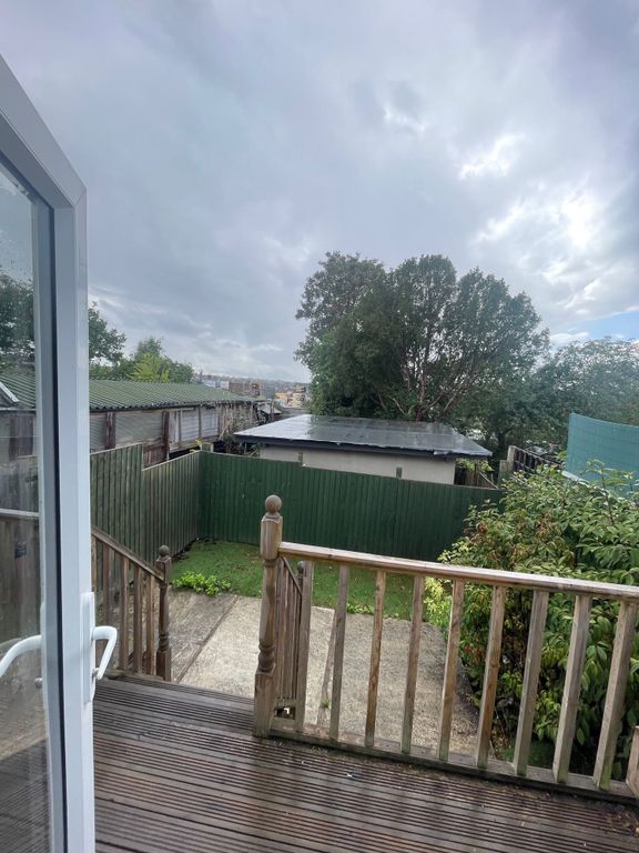 Property photo 3 of 12 A Peaceful Garden Area Viewed From A Wooden Deck W...