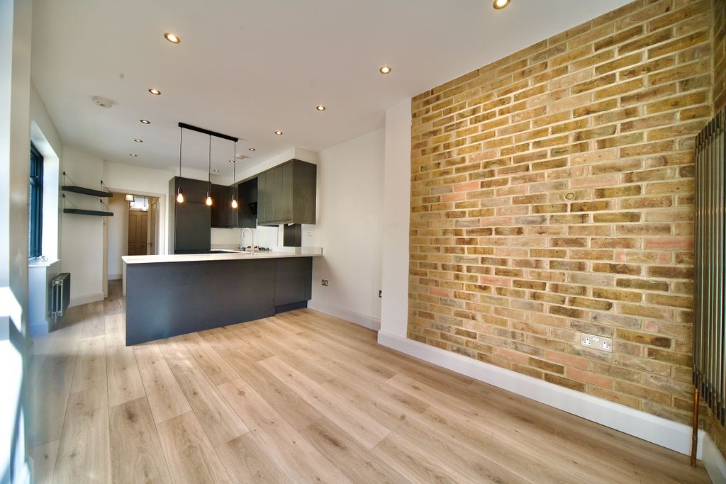 Property photo 3 of 13 Dining/Lounge Area