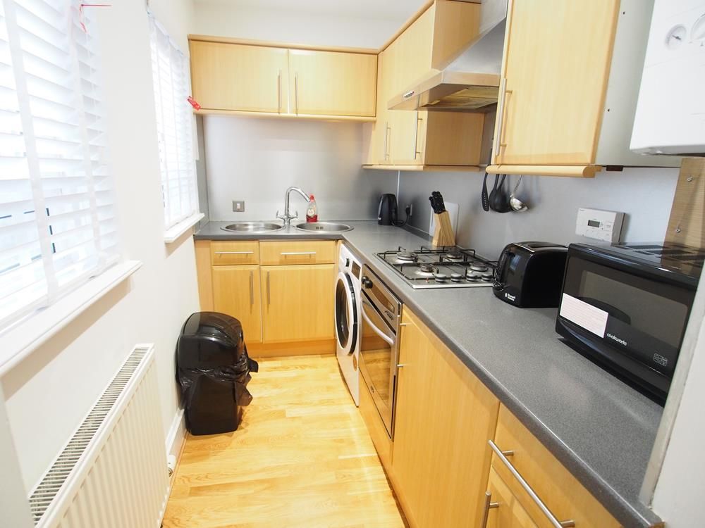 Property photo 3 of 12 Kitchen