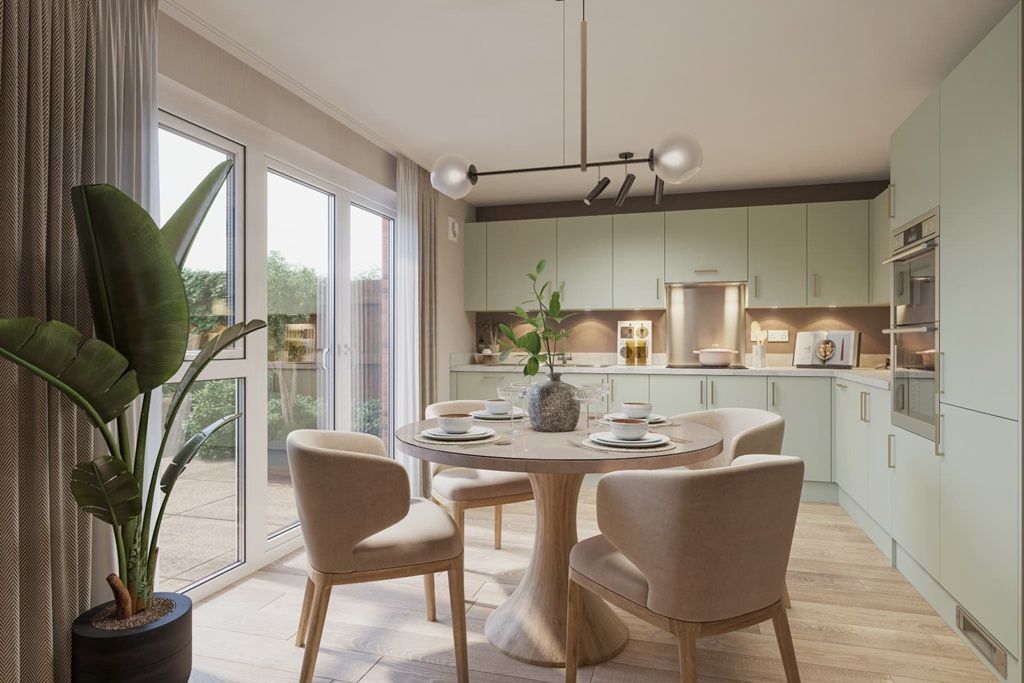 Property photo 3 of 8 A Modern Kitchen And Dining Area With French Doors To Rear Garden