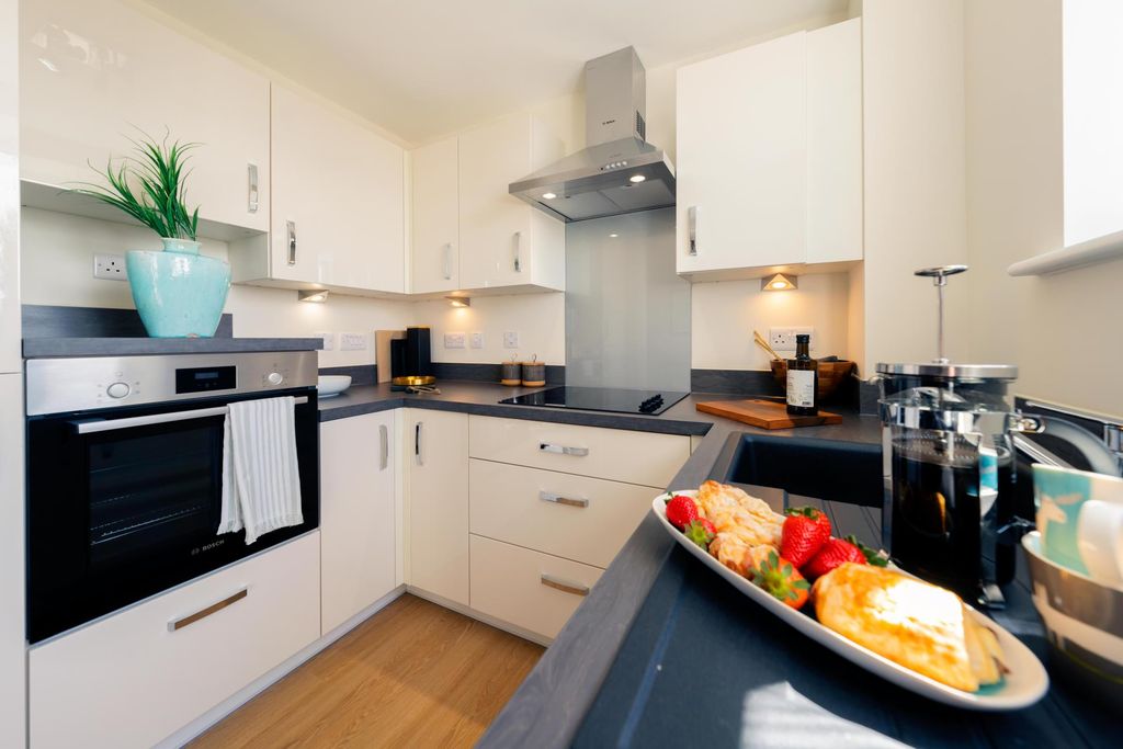 Property photo 1 of 14 Typical Kitchen