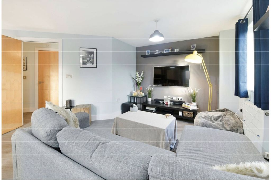 Property photo 1 of 10 Living Area