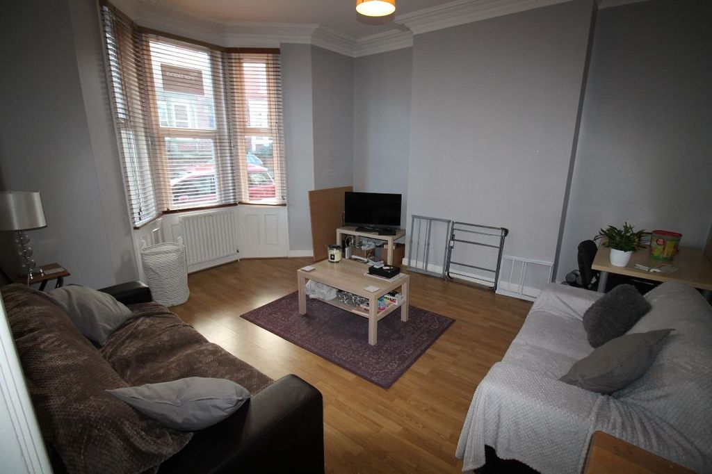 Property photo 3 of 14 A Bright And Welcoming Living Room Featuring Large...