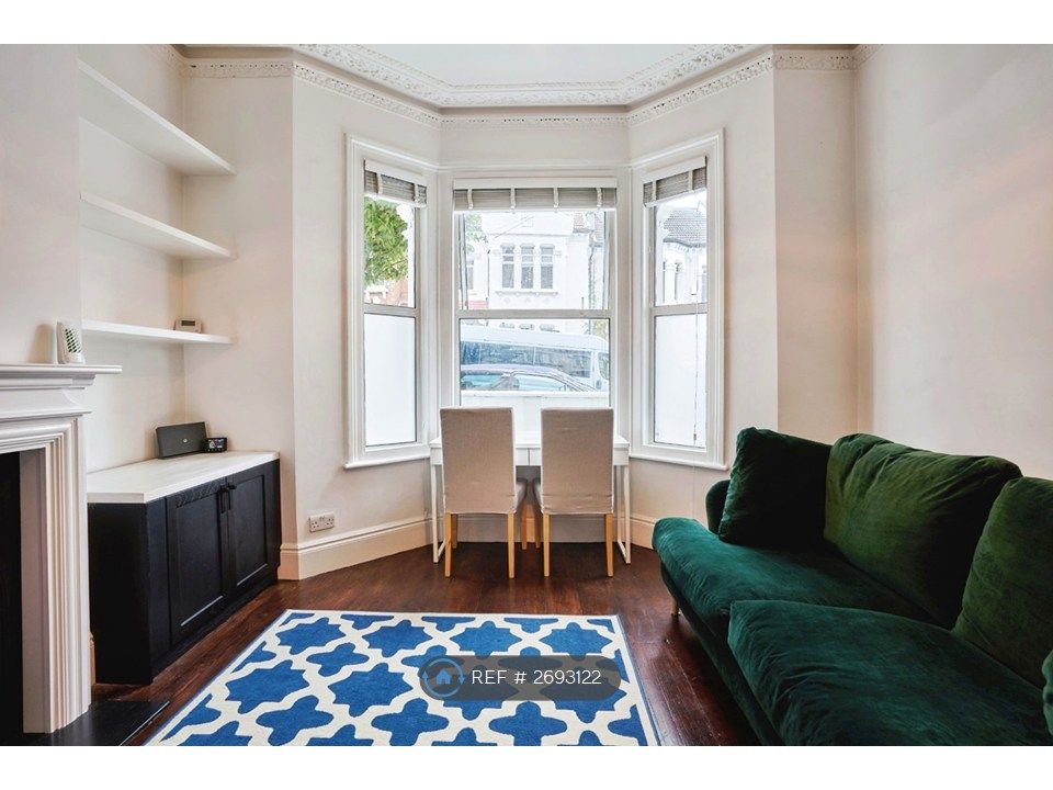 Property photo 3 of 13 Living Romm