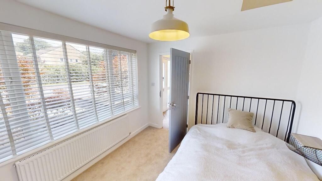 Property photo 2 of 16 Bright And Inviting Double Bedroom Featuring A Lar...