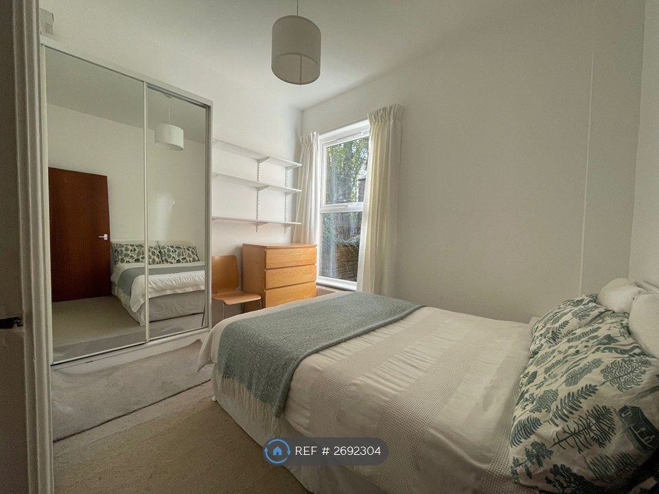 Property photo 3 of 11 Back Bedroom