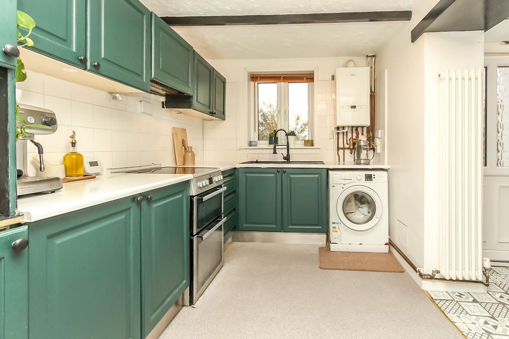 Property photo 3 of 12 Kitchen