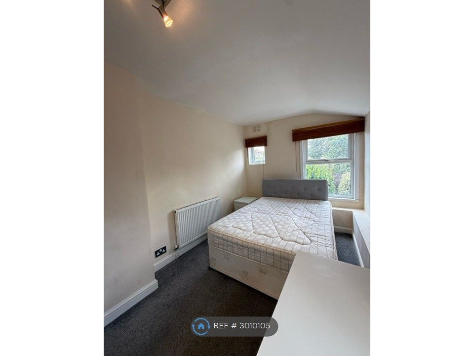Property photo 3 of 9 Back Bedroom