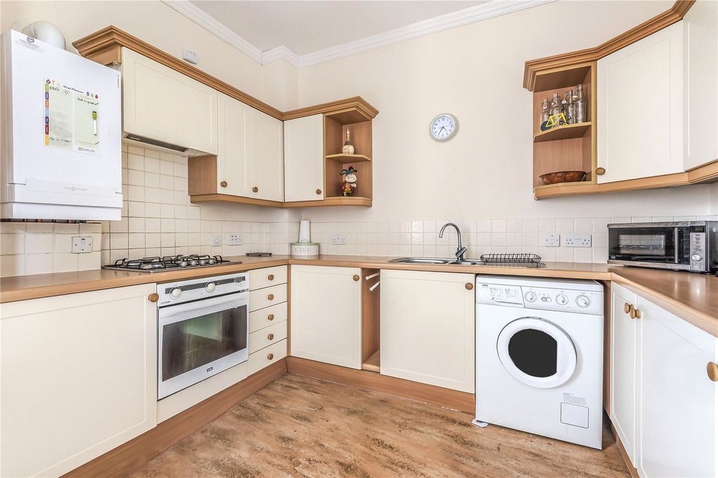 Property photo 3 of 12 Kitchen