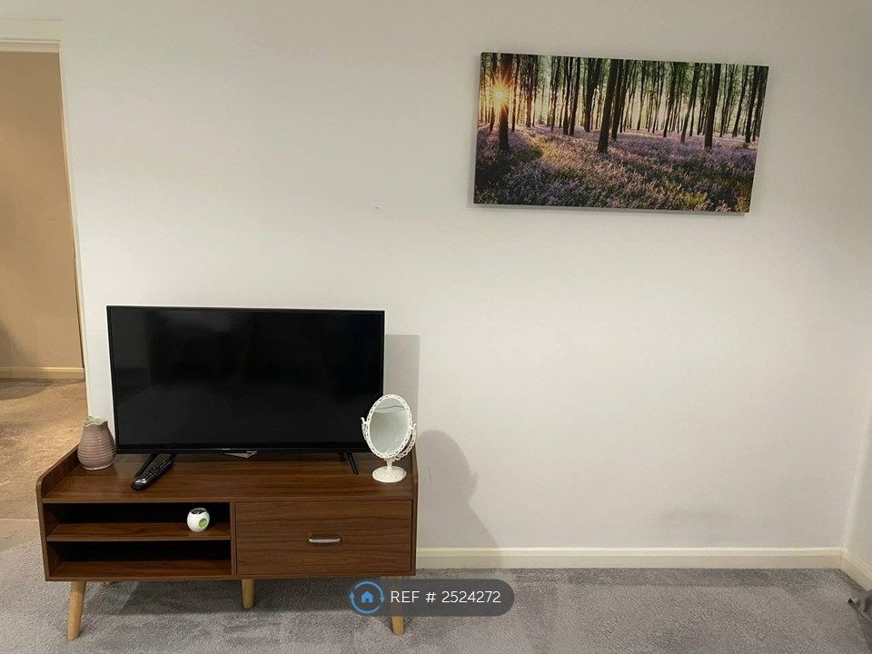 Property photo 3 of 11 Living Room And Tv
